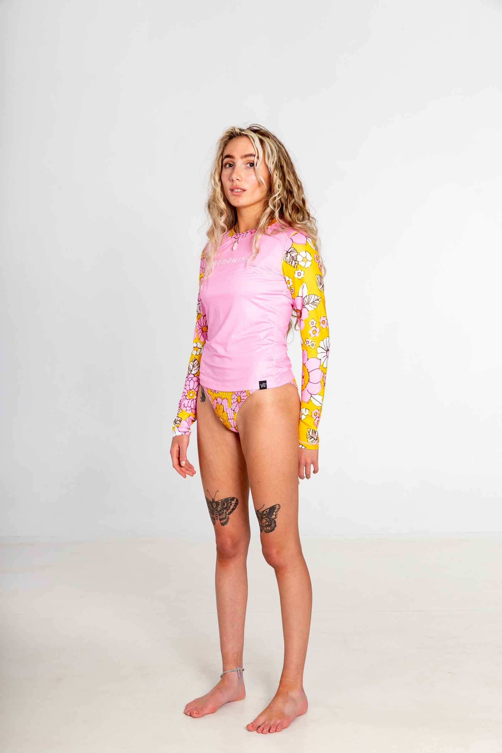 womens-recycled-rash-vest-andorwith-surf-skate-wear