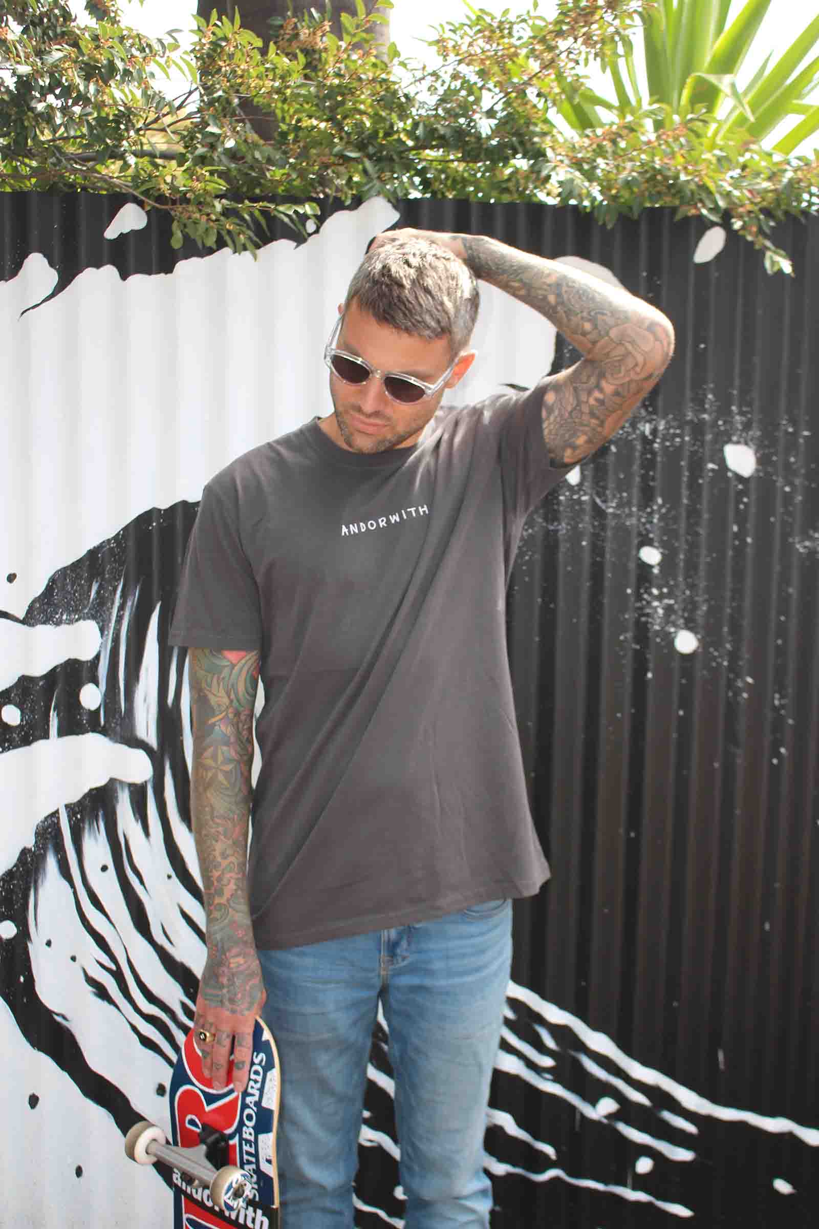 unisex-black-tshirt-andorwith-surf-skate-wear