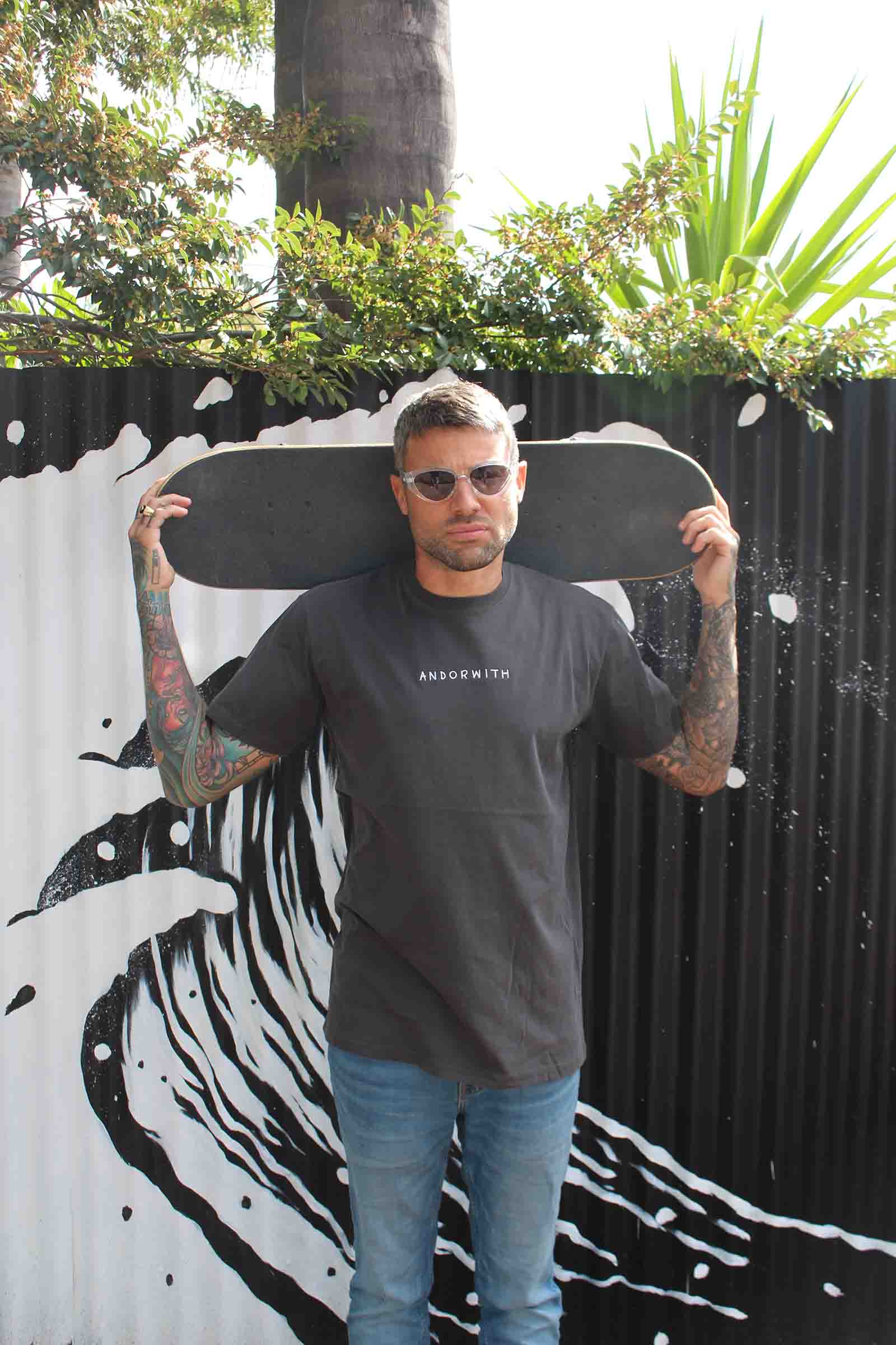 unisex-black-tshirt-andorwith-surf-skate-wear