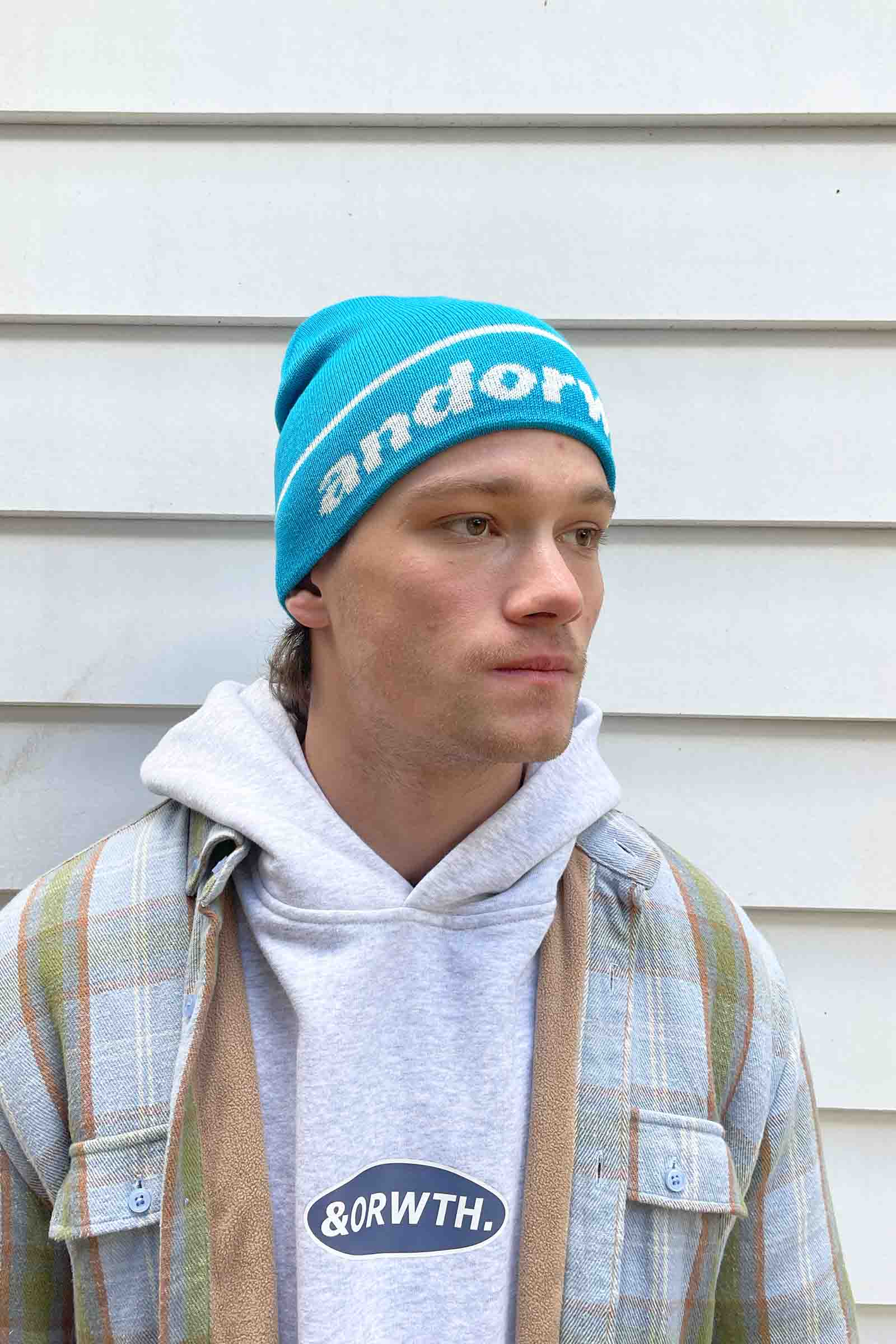 unisex-cuffless-wool-beanie-blue-andorwith-surf-skate-wear