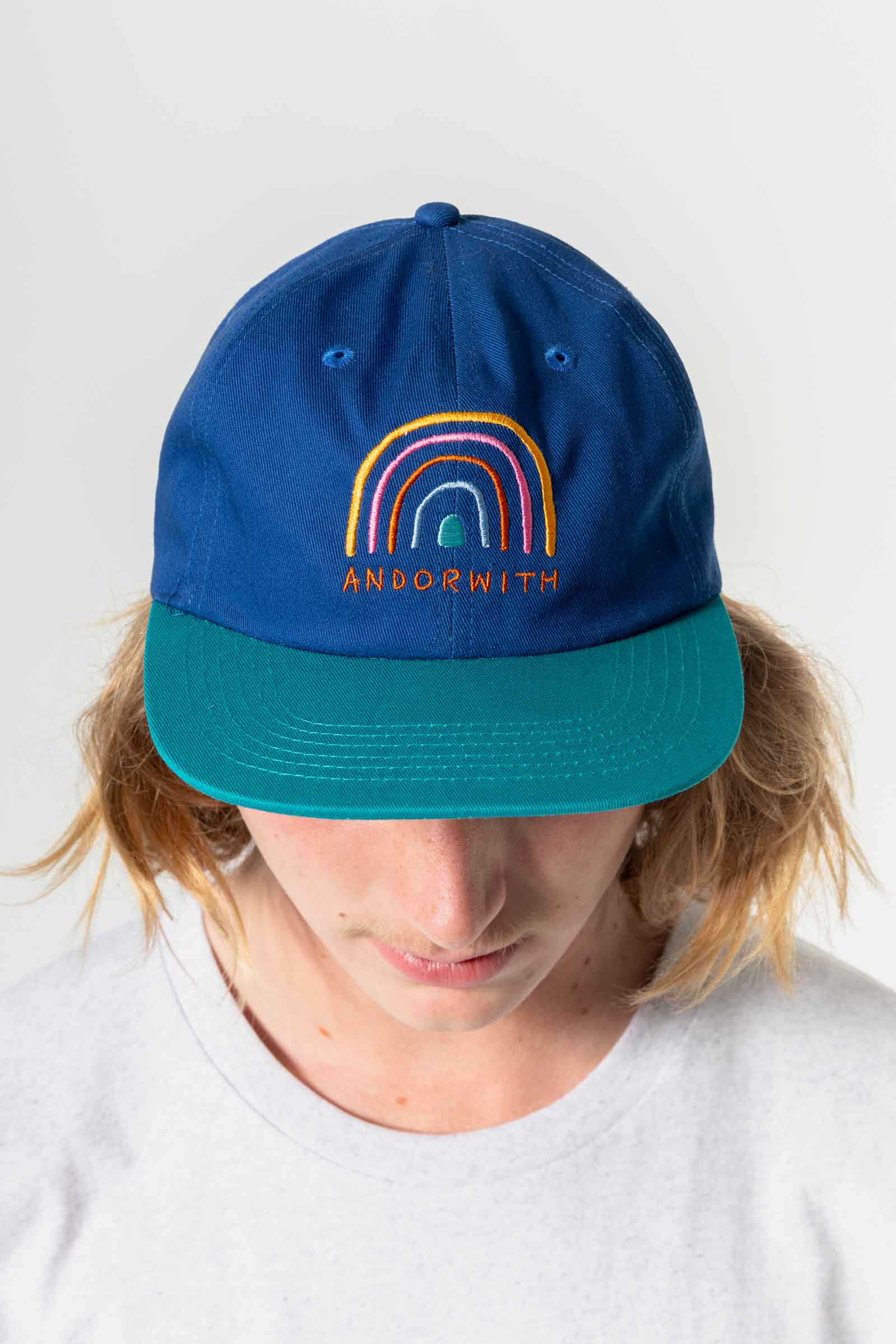 unisex_snapback-hat-blue-andorwith-surf-skate-wear