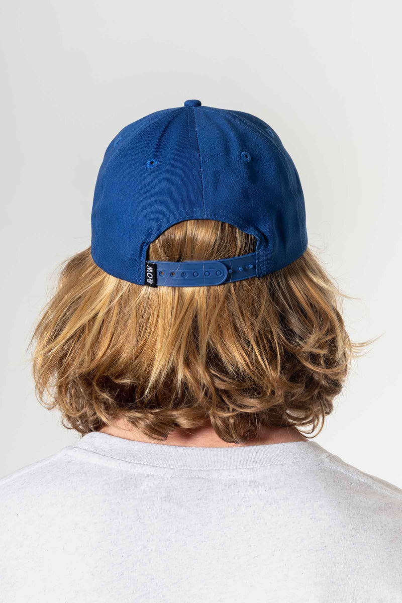 unisex_snapback-hat-blue-andorwith-surf-skate-wear