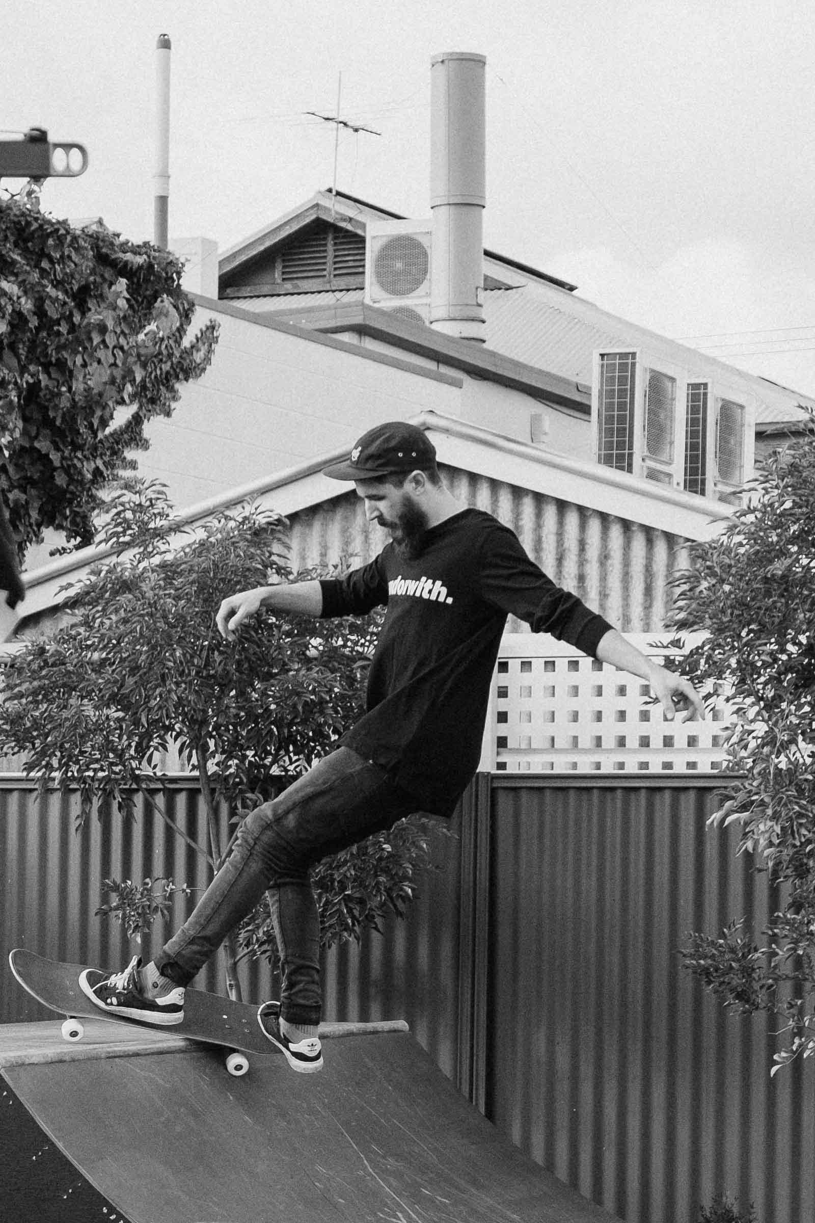 unisex_black-longsleeve-tshirt-andorwith-surf-skate-wear