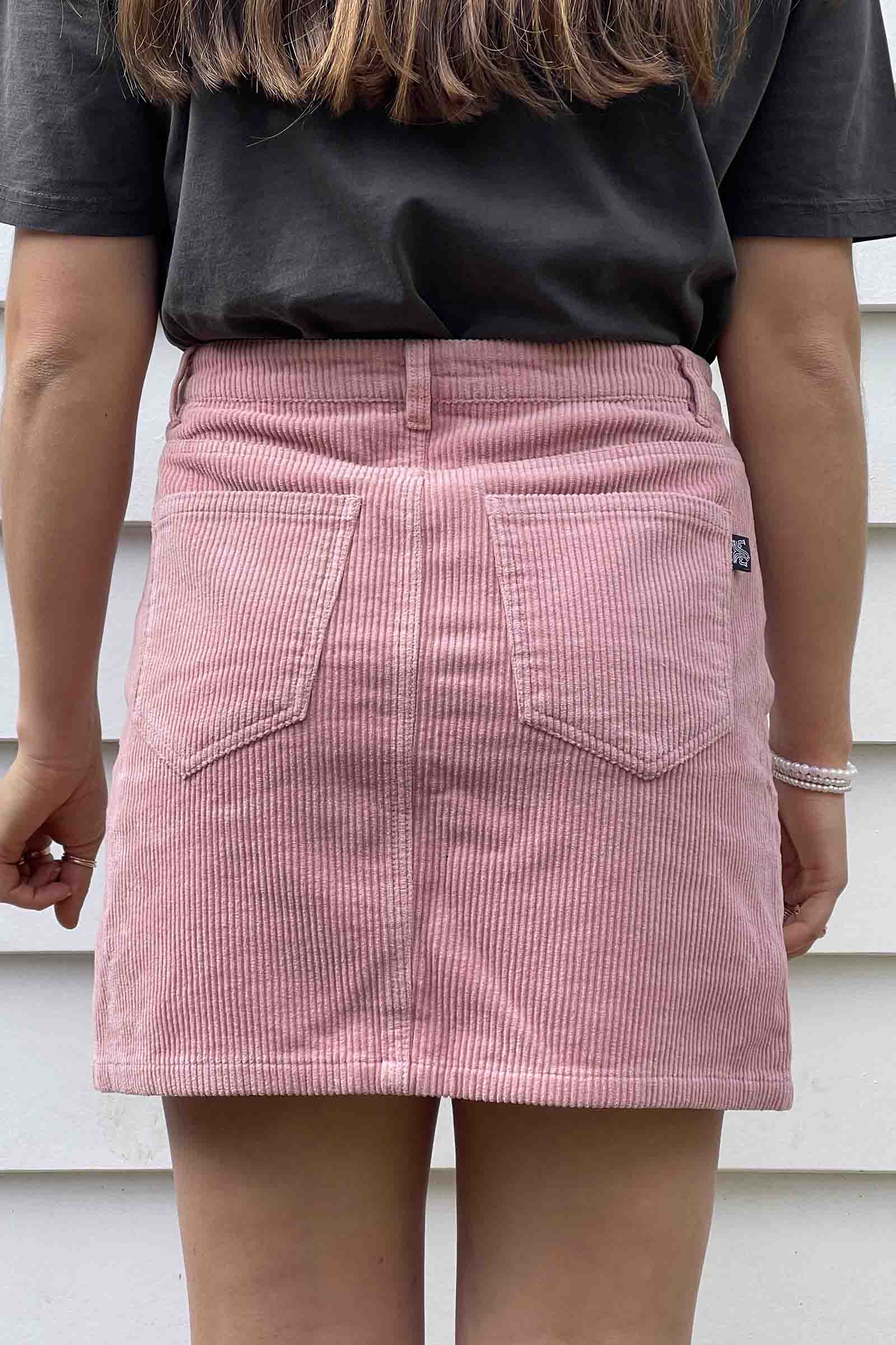 unisex-pink-corduroy-skirt-andorwith-surf-skate-wear